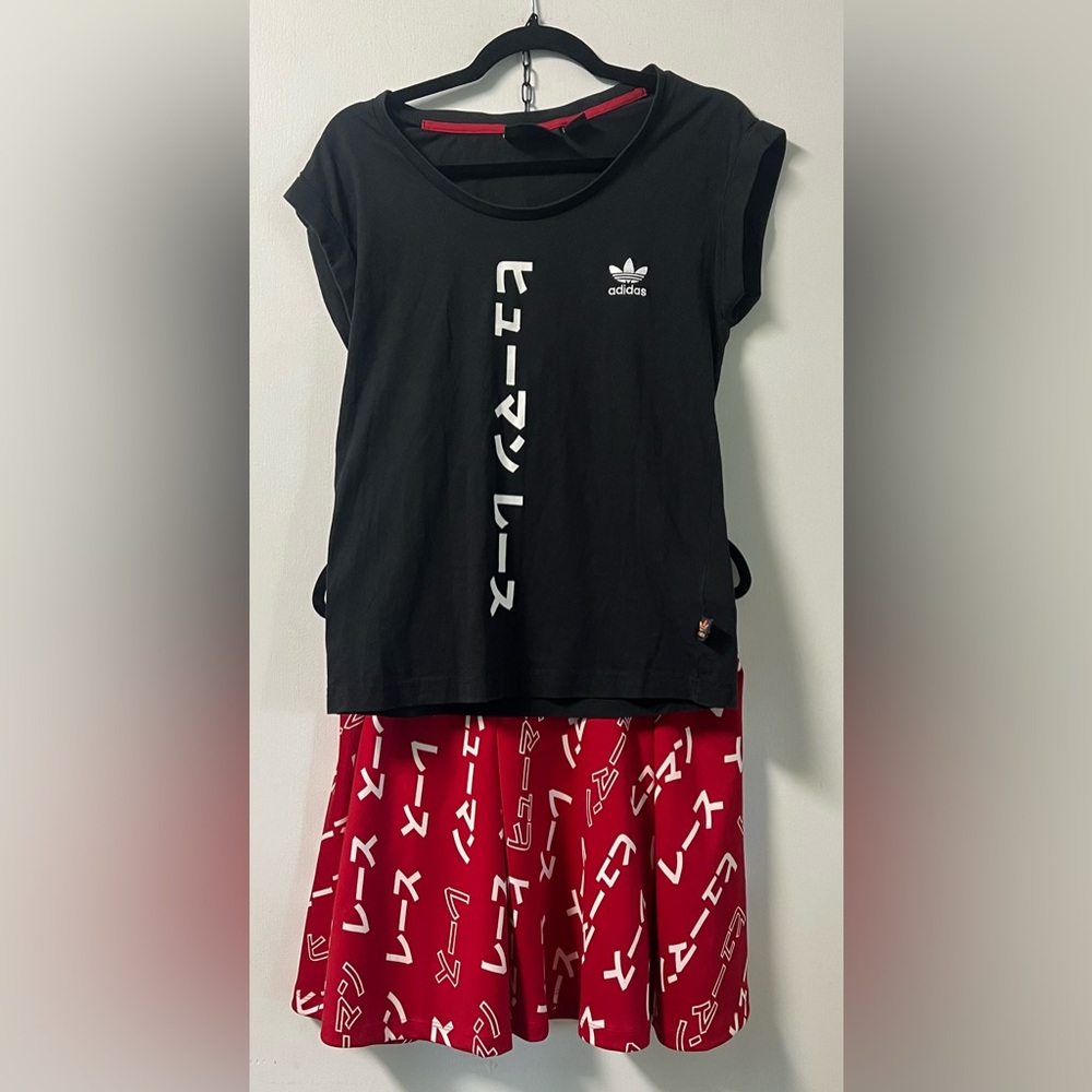 Pharrell Williams Adidas skirt and cuffed sleeveless shirt